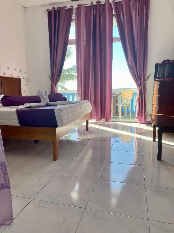 Chambre Double Deluxe avec Balcon - Vue sur Mer — Coco Villa